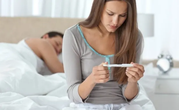 Couple with a pregnancy test